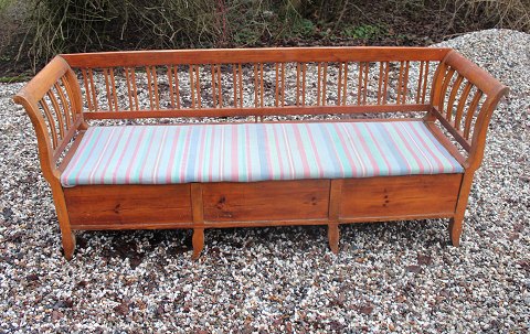 Antique bench from around 1880 in pine with upholstered seat and storage. 5000 
m2 showroom