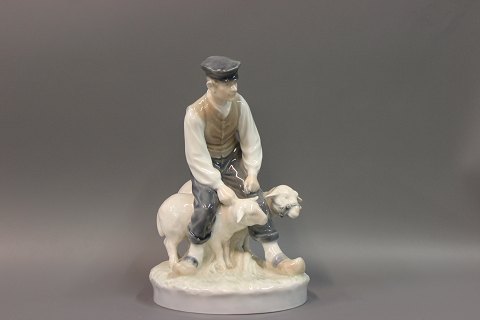 Royal Figure No. 627, peasant boy with two sheep. Height 20 cm. 5000 m2 
showroom.
