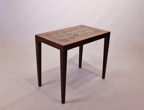 Sidetable in rosewood with Royal Copenhagen tiles by Severin Hansen for Haslev 
Furniture Factory.
5000m2 showroom.