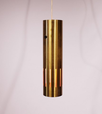 Vintage ceiling pendant in brass and orange laqcuer interior of danish design 
from the 1970s.
5000m2 showroom.