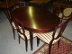 Heppelwhite dining room in mahogany with two extra leaves six dining chairs two 
arm chairs in good condition 5000 m2 showroom