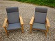 Hvile stole i egetræ med uldstof designet af  Hans Wegner fra Getama møbelfabrik 
5000 m2 udstilling