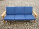 Sofa 3 seater in light oak designed by Hans Wegner with blue wool fabric made 
&#8203;&#8203;from Getama furniture factory in good condition 5000 showroom