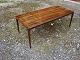 Coffee table in rosewood with pull flaps created at Silkeborg furniture designed 
by Johannes Andersen 5000 m2 showroom
