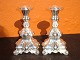 2 silver candlesticks, 830s in the rococo style. 50002m Showroom.