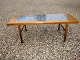 Coffee table with blue tiles.  Danish Design from the 1960s.
5000m2 Showroom.
