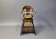 Antique high chair in polished Wood from around the 1860s.
5000m2 showroom.