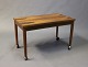 Small table on Wheels in rosewood of Danish Design from the 1960s.
5000m2 showroom.