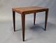 Small side table in rosewood designed by Severin Hansen for Haslev.
5000m2 showroom.