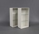 A pair of white Bookcase by Montana with glass shelves.
5000m2 showroom.
