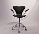 "Seven" office chair, model 3217, with armrests and swivel function in black 
leather  by Arne Jacobsen and Fritz Hansen.