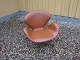 Swan chair designed by Arne Jacobsen in cognac colored leather 5000 exhibition