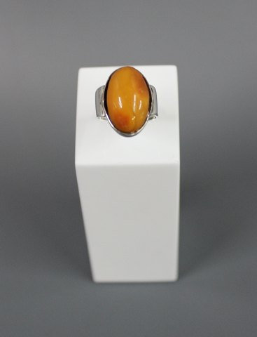 Silver ring with amber. 
5000 m2 showroom.