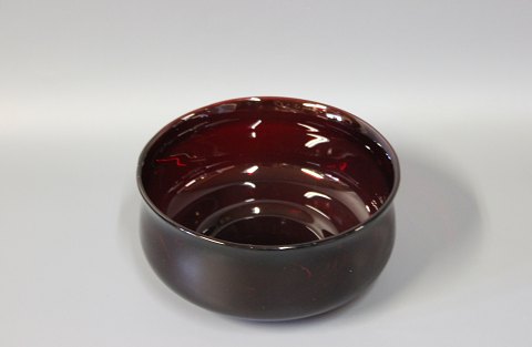 Dark red glass bowl by an unknown artist.
5000m2 showroom.