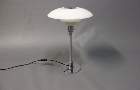 PH 3/2 table lamp designed in 1999 by Poul Henningsen and manufactured at Louis Poulsen.5000m2 showroom.