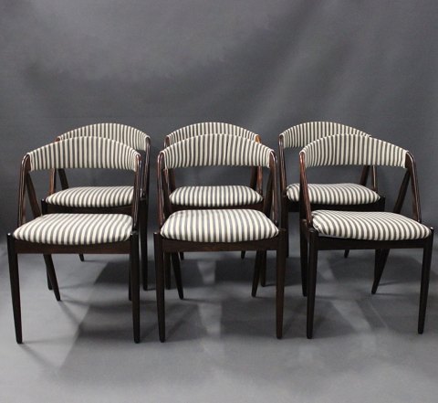 A set of six dining room chairs, model 31, by Kai Kristiansen and Schou 
Andersen.
5000m2 showroom.