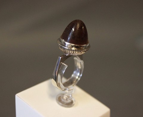 Ring in 925 sterling silver with Brown stone, stamped MPC by M.P.Christoffersen.
5000m2 showroom.