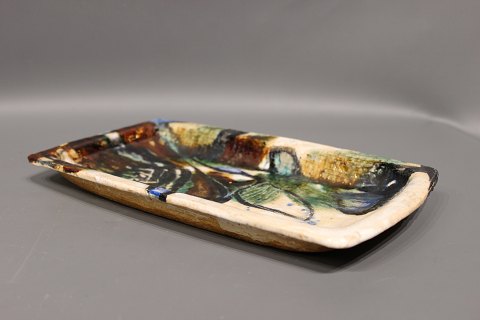 Ceramic dish with multicolored glaze by Jeppe Hagedorn Olsen.
5000m2 showroom.