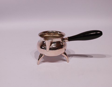 Small silver sauce boat with ebony handle by Christian Obbekjer, b1835-d1873.
5000m2 showroom.