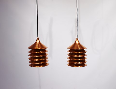A pair of Duett copper pendants designed by Bent Boysen in the 1970s.5000m2 showroom.