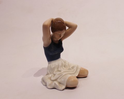 Royal Copenhagen porcelain figurine, girl setting her hair, no.: 4648.
5000m2 showroom.