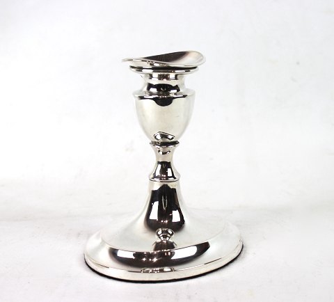 Candlestick of 830 silver stamped SV.T.
5000m2 showroom.