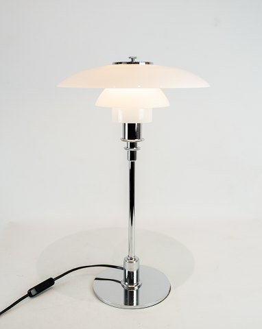 PH 3/2 table lamp with chrome stem and white opaline glass shades, designed by 
Poul Henningsen and manufactured by Louis Poulsen. 
5000m2 showroom.