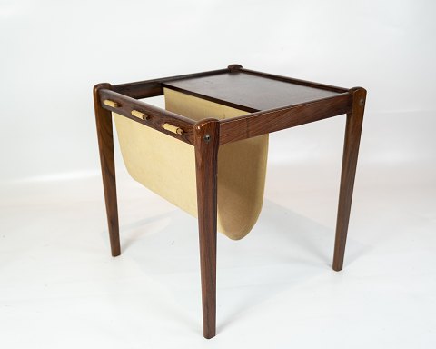 Small newspaper holder/lamp table i rosewood of Danish design from the 1960s.
5000m2 showroom.