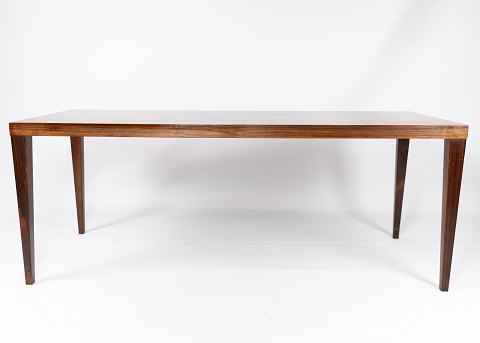 Oblong coffee table with extension leaf in rosewood of Danish Design 
manufactured at Silkeborg furniture factory in the 1960s.
5000m2 showroom.
