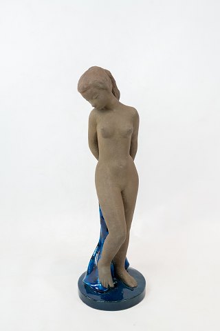 Tall stoneware figure, no.: 21639, by Royal Copenhagen. 
5000m2 showroom.