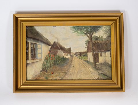 Oil painting with country motif and gilded frame, signed A. Toftlind.
5000m2 showroom.