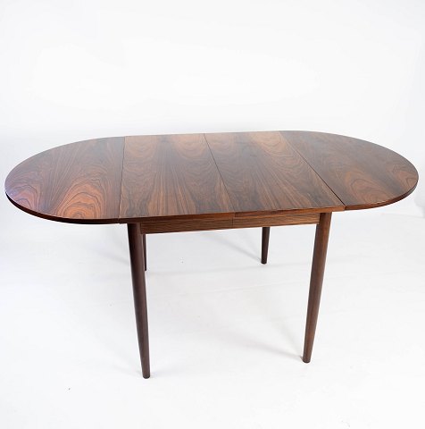Spisebord med klapper og udtræksplader, i palisander designet af Arne Vodder fra 
1960erne. 
5000m2 udstilling.