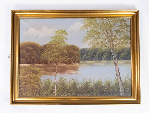 Oil painting with nature motif and gilded frame, without signature from the 
1930s.  
5000m2 showroom.