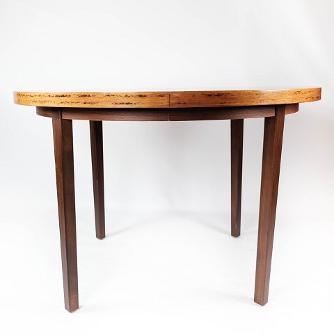 Rundt spisebord i palisander af svensk design fra 1960erne. 
5000m2 udstilling.