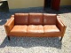 3 seater sofa in cognac colored leather in perfect condition Danish design from 
1960 of 5000 m2 showroom