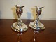 A pair of silver candlesticks, low model. 5000 m2 showroom.