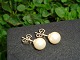 Pearl ear studs with freshwater pearls.  
5000 m2 showroom.