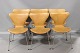 6 pcs Arne Jacobsen Model 3107. Re-upholstered with cognac colored patinated 
leather in good condition

