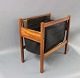 Newspaper holder in rosewood with black leather. In perfect condition