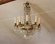 Crystal chandelier from France and the year 1880. The chandelier is in gilded 
bronze and has been restored.
5000m2 showroom.