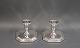 A pair of angular candlesticks in 830s. Model no.: 803 A and master stamped. 
5000m2 showroom.

