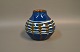 Ceramic vase with dark blue, White and Brown glaze from the 1960s by an unknown 
ceramic artist.
5000m2 showroom.