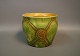 Keramik vase med grøn glasur og mønster på siderne fra 1960erne af Herman 
Kähler. 
5000m2 udstilling.