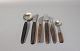 Cutlery set in Rosewood consisting of tablespoons, dinner- and lunch knifes and 
lunch forks, carving fork and demitasse spoon. 
5000m2 showroom.