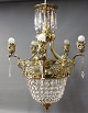 Crystal Chandelier, Five-armed with patinated brass .