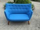 We have recently upholstered this sofa in light blue Hallingdal at our workshop.