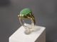14 ct. goldring with green stone.
5000m2 showroom.