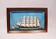 Beautifully decorated halfship in dark wooden frame from around the 1930s.
5000m2 showroom.