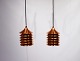 A pair of Duett copper pendants designed by Bent Boysen in the 1970s.5000m2 showroom.