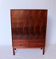 Large cabinet in rosewood of danish design and manufactured by Brouer in the 
1960s.
5000m2 showroom.